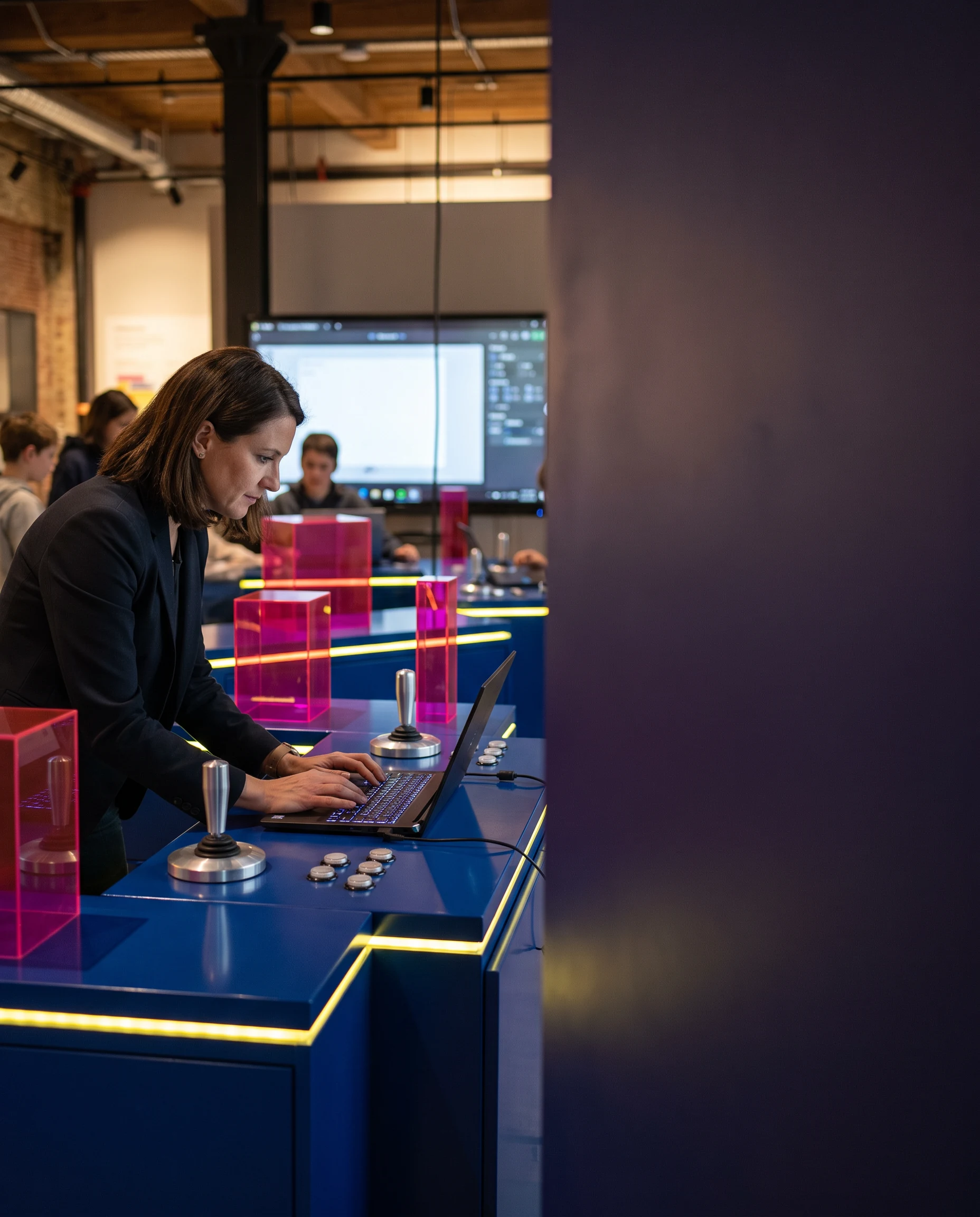 Person working at an arcade-like product station